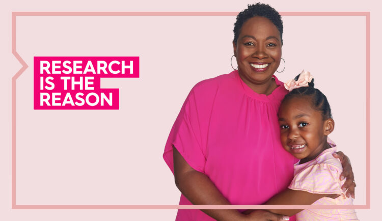 a portrait of tamisha and her daughter smiling and embracing against a light pink background